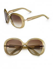 A flattering frame for any face shape in glossy plastic with logo accented metal temples. Available in golden sand with brown gradient lens or grey with grey gradient lens. Logo temples100% UV protectionMade in Italy A flattering frame for any face shape in glossy plastic with logo accented metal temples. Available in golden sand with brown gradient lens or grey with grey gradient lens. Logo temples100% UV protectionMade in Italy