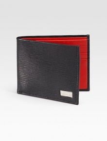 A slim-line design handsomely crafted in Italy from embossed calfskin leather.One bill compartmentSix card slots4¼ x 3½Made in Italy A slim-line design handsomely crafted in Italy from embossed calfskin leather.One bill compartmentSix card slots4¼ x 3½Made in Italy