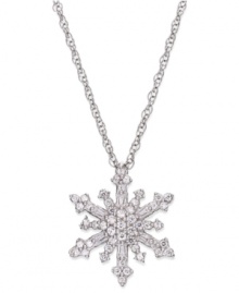 Give her a gift as unique as she is. This stunning snowflake pendant features an intricate pattern of round-cut diamonds (1/4 ct. t.w.) and sterling silver. Approximate length: 18 inches. Approximate drop: 5/8 inch. Give her a gift as unique as she is. This stunning snowflake pendant features an intricate pattern of round-cut diamonds (1/4 ct. t.w.) and sterling silver. Approximate length: 18 inches. Approximate drop: 5/8 inch.
