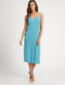 Soft, elegant and eye-catching with lace trim along the neckline.Adjustable shoulder straps About 46 from shoulder to hem 65% modal/35% polyester; machine wash Imported Soft, elegant and eye-catching with lace trim along the neckline.Adjustable shoulder straps About 46 from shoulder to hem 65% modal/35% polyester; machine wash Imported