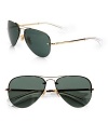 A classic favorite with metal frames and logo detail on temple. Available in silver with grey gradient lens or gold with green lens.UV 400 lens 100% UV protection Made in Italy 
