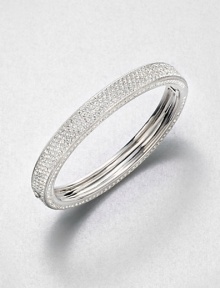 Shimmer on the top and shimmer on the edges adds up to dazzle that just goes on and on.CrystalRhodium platingDiameter, about 2.25Hinged with tongue-and-groove claspImported Shimmer on the top and shimmer on the edges adds up to dazzle that just goes on and on.CrystalRhodium platingDiameter, about 2.25Hinged with tongue-and-groove claspImported