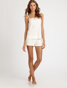 Semi-sheer embroidered cotton adorns the neckline of this truly feminine design. Square necklineAdjustable spaghetti strapsSemi-sheer embroidered trimAbout 24¾ from shoulder to hem52% cotton/42% modal/6% elastaneHand washMade in Italy Semi-sheer embroidered cotton adorns the neckline of this truly feminine design. Square necklineAdjustable spaghetti strapsSemi-sheer embroidered trimAbout 24¾ from shoulder to hem52% cotton/42% modal/6% elastaneHand washMade in Italy