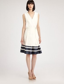 Sculptural and chic, tailored with a full, pleated skirt banded with bold contrasting stripes at the hem.V necklineSleevelessD-ring self beltPleated skirtConcealed back zipFully linedAbout 23 from natural waist38% cotton/36% viscose/26% linenDry cleanImported of Italian fabricModel shown is 5'9 (175cm) wearing US size 4. 