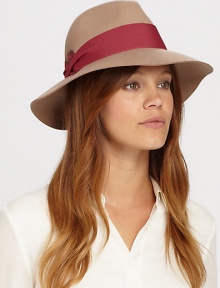 Remain warm and stylish this season with this floppy fedora style trimmed with pleated cotton band and feather detail for a timeless finish.WoolOne size fits mostSpot cleanImported Remain warm and stylish this season with this floppy fedora style trimmed with pleated cotton band and feather detail for a timeless finish.WoolOne size fits mostSpot cleanImported