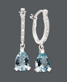 An elegant spin on the traditional hoop. Vibrant aquamarine teardrops (2 ct. t.w.) dangle dramatically from a 14k white gold hoop setting dusted in diamond accents. Approximate drop: 1/4 inch.