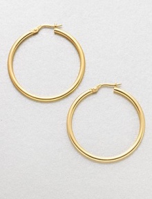 A simply classic, yet relevant design in radiant 18k gold. 18k goldLength, about 1.4Hinged post backMade in Italy A simply classic, yet relevant design in radiant 18k gold. 18k goldLength, about 1.4Hinged post backMade in Italy