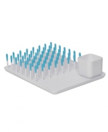 Bring baby back to a well-prepared home. Bottles, utensils, straws, breast pumps and more are kept elevated, secure and upright while they dry on this ingenious drying rack. The deep walls and uniquely shaped corners capture and easily pour out excess water, while the ribbed space keeps items away from water for incredible ventilation and a quicker dry. Lifetime warranty. Bring baby back to a well-prepared home. Bottles, utensils, straws, breast pumps and more are kept elevated, secure and upright while they dry on this ingenious drying rack. The deep walls and uniquely shaped corners capture and easily pour out excess water, while the ribbed space keeps items away from water for incredible ventilation and a quicker dry. Lifetime warranty.