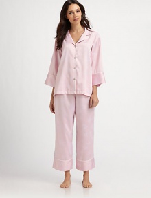 Brushed-back satin, so soft and warm inside, shimmers with a subtle floral print.Notched lapelsButton frontLong sleevesElastic waist pantsInseam, about 26Polyester/cottonMachine washImported Brushed-back satin, so soft and warm inside, shimmers with a subtle floral print.Notched lapelsButton frontLong sleevesElastic waist pantsInseam, about 26Polyester/cottonMachine washImported