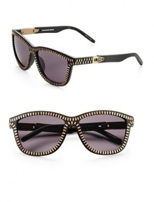 Modern, retro shaped acetate frames with contrasting brass zipper trim and zipper pull temple detail. Available in matte black with brass zipper and dark grey lens.Acetate/beryllium copper UV 400 lens Imported Modern, retro shaped acetate frames with contrasting brass zipper trim and zipper pull temple detail. Available in matte black with brass zipper and dark grey lens.Acetate/beryllium copper UV 400 lens Imported