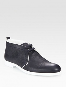 An eye-catching modern silhouette in a trendy two-tone design and pebbled leather. Pebbled calf leather upperLeather liningPadded insoleRubber soleMade in Italy An eye-catching modern silhouette in a trendy two-tone design and pebbled leather. Pebbled calf leather upperLeather liningPadded insoleRubber soleMade in Italy