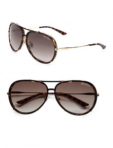 An elegant blend of stainless steel with glossy plastic accents in a classic aviator frame. Available in havana with brown gradient lens. Logo temples100% UV protectionMade in Italy An elegant blend of stainless steel with glossy plastic accents in a classic aviator frame. Available in havana with brown gradient lens. Logo temples100% UV protectionMade in Italy