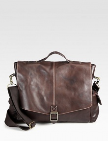 Crafted from luxurious full grain enzyme washed vachetta leather satchel-style messenger bag with contrast digital print, this is a suitable accessory for your everyday needs.Flap, buckle closureTop handleRemovable, adjustable shoulder strapExterior pouch pocketsInterior slip pocketCotton twill/leather liningLeather13W x 16H x 5DImported Crafted from luxurious full grain enzyme washed vachetta leather satchel-style messenger bag with contrast digital print, this is a suitable accessory for your everyday needs.Flap, buckle closureTop handleRemovable, adjustable shoulder strapExterior pouch pocketsInterior slip pocketCotton twill/leather liningLeather13W x 16H x 5DImported