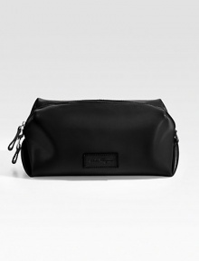 The ultimate travel essential, crafted in Italy from smooth leather. Zip closure Leather logo plaque detail 11W X 4¾H X 4¾D Made in Italy The ultimate travel essential, crafted in Italy from smooth leather. Zip closure Leather logo plaque detail 11W X 4¾H X 4¾D Made in Italy