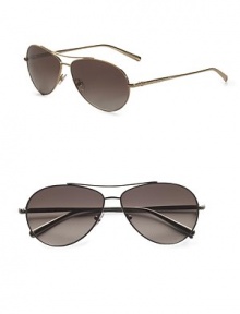 From the Waverly Collection. Titanium aviator features a sleek waverly temple. Available in silver with palladium electroplating and smoke double gradient lens or gold with 22k gold electroplating and brown double gradient lens. 100% UV protection Imported From the Waverly Collection. Titanium aviator features a sleek waverly temple. Available in silver with palladium electroplating and smoke double gradient lens or gold with 22k gold electroplating and brown double gradient lens. 100% UV protection Imported
