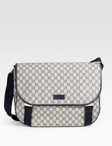 GG plus coated canvas with leather trim and nickel hardware. Adjustable shoulder strap Flap with engraved clip closures Interior pocket 15¾W X 11¼H X 5D Made in Italy GG plus coated canvas with leather trim and nickel hardware. Adjustable shoulder strap Flap with engraved clip closures Interior pocket 15¾W X 11¼H X 5D Made in Italy