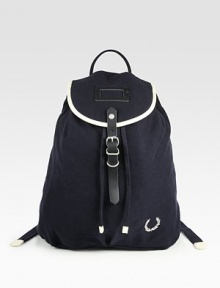Whether on campus or off, tote your books, and the like, around in style with this vintage-inspired backpack crafted in durable cotton canvas.Flap, buckle closureDrawstring tieTop handleInterior zip pocketCotton14W x 16H x 5DImported Whether on campus or off, tote your books, and the like, around in style with this vintage-inspired backpack crafted in durable cotton canvas.Flap, buckle closureDrawstring tieTop handleInterior zip pocketCotton14W x 16H x 5DImported