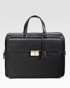 An elegant briefcase in textured saffiano leather with a large envelope exterior pocket. Zip closure Top handles Exterior pocket with clasp closure Interior zip pocket 15¾W X 12H X 2¼D Made in Italy 