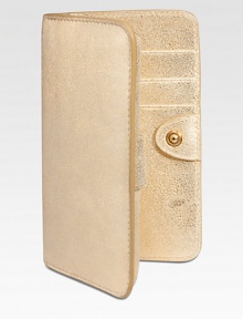 Designed to hold your iphone in slim, trim style, this case of glistening metallic goatskin slips right into your bag or pocket.HandcraftedFoldover snap closeiphone pocketThree card slots5¼L X 3WImported Designed to hold your iphone in slim, trim style, this case of glistening metallic goatskin slips right into your bag or pocket.HandcraftedFoldover snap closeiphone pocketThree card slots5¼L X 3WImported