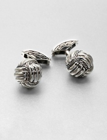 A simple, yet exquisite design, set in sterling silver and finished with a charming, braided detail.Sterling silverAbout ¼ diam.Imported A simple, yet exquisite design, set in sterling silver and finished with a charming, braided detail.Sterling silverAbout ¼ diam.Imported