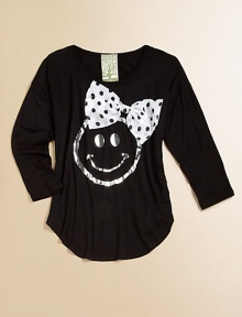 Don't worry, be happy, it's a cheery top with metallic smiley face and polka dot bow.ScoopneckLong sleevesPullover styleRound hem95% rayon/5% spandexHand washMade in the USA of imported fabric