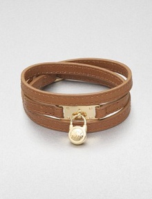 This effortless style features a chic logo accented padlock charm on a supple wrapped leather strip. LeatherGoldtone brassLength, about 25Buckle closureImported 