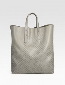 A graphic-inspired tote that resembles city cool, rendered in genuine printed leather.Top handlesLeather12W x 14H x 4DMade in Italy A graphic-inspired tote that resembles city cool, rendered in genuine printed leather.Top handlesLeather12W x 14H x 4DMade in Italy