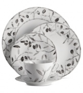 Make your peace. A serene watercolor spans white Limoges porcelain in the Olive Branch place setting, epitomizing the meticulous detail and natural allure of designer Michael Aram.