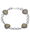 Hearts are in the right place on this bracelet from Genevieve & Grace. Crafted from sterling silver, the bracelet features marcasite and champagne crystal hearts for a lustrous touch. Approximate length: 7 inches. Approximate width: 1/2 inch.
