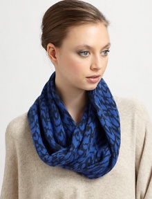 Ultra-soft in an animal printed plush wool and angora blend for supreme warmth and style.Merino Wool/Angora/Nylon14.5W X 12.5L X 13.5DDry cleanImported