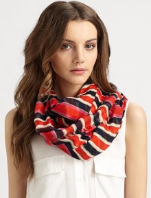 Sporty, brightly hued stripes and delicate eyelash fringe decorate this wear-with-all piece.Modal47 X 67Dry cleanImported Sporty, brightly hued stripes and delicate eyelash fringe decorate this wear-with-all piece.Modal47 X 67Dry cleanImported