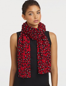 A warm knitted wool design with a bold and fun print. WoolAbout 12 X 86Dry cleanImported A warm knitted wool design with a bold and fun print. WoolAbout 12 X 86Dry cleanImported