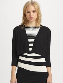 A simply elegant design that's poised to be the perfect finishing touch to an outfit.Open-front designThree-quarter sleevesAbout 23 from shoulder to hem55% rayon/45% nylonDry cleanImported Model shown is 5'9½ (176cm) wearing US size Small. A simply elegant design that's poised to be the perfect finishing touch to an outfit.Open-front designThree-quarter sleevesAbout 23 from shoulder to hem55% rayon/45% nylonDry cleanImported Model shown is 5'9½ (176cm) wearing US size Small.