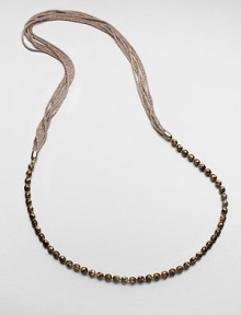 An artistic and modern design with faceted beads on a multi-row mesh chain. Glass beadsGalvanized mesh wireLength, about 39Slip-on styleImported An artistic and modern design with faceted beads on a multi-row mesh chain. Glass beadsGalvanized mesh wireLength, about 39Slip-on styleImported