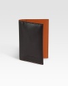 A slim-line style that fits easily into a jacket pocket, designed with topstitch detail in smooth leather. Debossed logo detail Four card slots 2¾W X 4¼H Made in Italy 