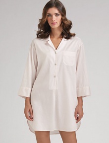 A loose-fitting, relaxed style with a traditional notch collar and full-length sleeves. Pullover style Partial button-front placket Front patch pocket About 36 from shoulder to hem Cotton; machine wash Imported A loose-fitting, relaxed style with a traditional notch collar and full-length sleeves. Pullover style Partial button-front placket Front patch pocket About 36 from shoulder to hem Cotton; machine wash Imported
