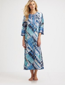 Lightweight charmeuse skims the body in an effortless caftan pullover.JewelneckZip placketThree-quarter sleevesAbout 53 from shoulder to hemPolyesterMachine washImported Lightweight charmeuse skims the body in an effortless caftan pullover.JewelneckZip placketThree-quarter sleevesAbout 53 from shoulder to hemPolyesterMachine washImported