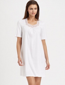 Embroidered geometric shapes adorn the neckline of this ultra-soft silhouette with feminine ruching. Sweetheart necklieShort sleevesTulle and lace embroidery at the necklineFront ruchingAbout 35 from shoulder to hemBody: mercerized cottonLace: polyesterMachine washImported Embroidered geometric shapes adorn the neckline of this ultra-soft silhouette with feminine ruching. Sweetheart necklieShort sleevesTulle and lace embroidery at the necklineFront ruchingAbout 35 from shoulder to hemBody: mercerized cottonLace: polyesterMachine washImported