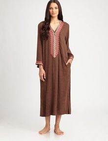 A zip-front silhouette featuring intricate jacquard trim in vivid colors for a bohemian-inspired effect. V-neckHalfway zip frontLong sleevesJacquard trim at the neckline and cuffsFront slash pocketsAbout 53 from shoulder to hemRayonHand washMade in China A zip-front silhouette featuring intricate jacquard trim in vivid colors for a bohemian-inspired effect. V-neckHalfway zip frontLong sleevesJacquard trim at the neckline and cuffsFront slash pocketsAbout 53 from shoulder to hemRayonHand washMade in China