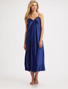 An utterly romantic silhouette of silky-smooth fabric with delicate lace trim for quiet evenings. Sweetheart necklineGathered bust for added drapeAdjustable spaghetti strapsAbout 51 from shoulder to hemPolyesterMachine washImported An utterly romantic silhouette of silky-smooth fabric with delicate lace trim for quiet evenings. Sweetheart necklineGathered bust for added drapeAdjustable spaghetti strapsAbout 51 from shoulder to hemPolyesterMachine washImported