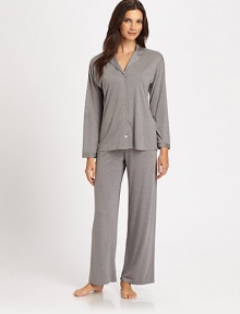 This traditional two-piece set rendered in soft jersey fabric is the ultimate in luxurious sleepwear. Notch collarDropped shouldersLong sleeves with banded cuffsButton frontElastic waistbandInseam, about 2965% modal/35% polyesterMachine washImported This traditional two-piece set rendered in soft jersey fabric is the ultimate in luxurious sleepwear. Notch collarDropped shouldersLong sleeves with banded cuffsButton frontElastic waistbandInseam, about 2965% modal/35% polyesterMachine washImported