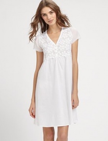 Bloom into spring with this pretty gown, with intricately crocheted floral embroidery and romantic cap sleeves. V-neckHalfway button closureCrocheted lace bodiceCap sleeves with lace trimPleating for added drapeAbout 37½ from shoulder to hemMercerized cottonEmbroidery: polyesterMachine washImported Bloom into spring with this pretty gown, with intricately crocheted floral embroidery and romantic cap sleeves. V-neckHalfway button closureCrocheted lace bodiceCap sleeves with lace trimPleating for added drapeAbout 37½ from shoulder to hemMercerized cottonEmbroidery: polyesterMachine washImported