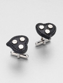 Heart-shaped cuff links set in signature saffiano leather with metal screw details in the center.Brass/glassAbout ¾ diam.Made in the United Kingdom Heart-shaped cuff links set in signature saffiano leather with metal screw details in the center.Brass/glassAbout ¾ diam.Made in the United Kingdom