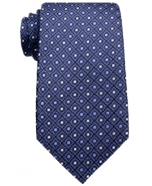 A classic neat pattern gives this Tasso Elba tie perennial appeal in your dress wardrobe. A classic neat pattern gives this Tasso Elba tie perennial appeal in your dress wardrobe.
