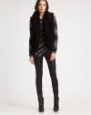 Work the trend in this luscious faux fur vest with a shawl collar and convenient hook-and-eye closure. Shawl collarFront hook-and-eye closureFully linedAbout 25 from shoulder to hemPolyester faux furDry cleanMade in USA of Italian fabricModel shown is 5'10 (177cm) wearing US size Small.