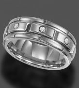 This Triton ring embodies strength and sophistication. Three round-cut diamonds (1/10 ct. t.w.) sit in a comfortable, patterned band. Crafted in titanium. Approximate band width: 8 mm. Sizes 8-15.