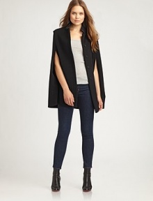 Truly a statement piece, this button-front cape is universally flattering. A hint of cashmere adds luxurious appeal to this design.Faux-leather stand collarButton frontAbout 29 from shoulder to hem70% wool/20% polyamide/10% cashmereDry cleanMade in Italy Model shown is 5'9 (175cm) wearing US size 4. Truly a statement piece, this button-front cape is universally flattering. A hint of cashmere adds luxurious appeal to this design.Faux-leather stand collarButton frontAbout 29 from shoulder to hem70% wool/20% polyamide/10% cashmereDry cleanMade in Italy Model shown is 5'9 (175cm) wearing US size 4.