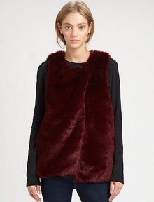 Vamp up any ensemble with this season's must-have layer of plush faux fur. RoundneckSleevelessButton frontSlash pocketsAbout 27 from shoulder to hemPolyesterDry cleanImportedModel shown is 5'9 (176cm) wearing US size XS/S. Vamp up any ensemble with this season's must-have layer of plush faux fur. RoundneckSleevelessButton frontSlash pocketsAbout 27 from shoulder to hemPolyesterDry cleanImportedModel shown is 5'9 (176cm) wearing US size XS/S.