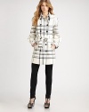 Classic trench styling, in an iconic check patterned wool blend.Foldover collarEpaulettesDouble breasted button frontSelf beltAsymmetrical sleevesBelted cuffsFully linedAbout 31 from shoulder to hem52% polyester/43% wool/5% lyocellDry cleanMade in Italy of imported fabricModel shown is 5'9½ (176cm) wearing US size 4. Additional Information Women's Premier Designer & Contemporary Size Guide 