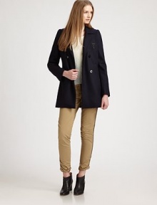 A true classic in rich blended wool, double-breasted with a tres-chic Paris pin at the chest.Notched-collarGathered shouldersLong sleevesDouble-breasted button frontWelt pocketsAbout 30 from shoulder to hem65% wool/35% viscoseDry cleanImportedModel shown is 5'10 (177cm) wearing US size 2. A true classic in rich blended wool, double-breasted with a tres-chic Paris pin at the chest.Notched-collarGathered shouldersLong sleevesDouble-breasted button frontWelt pocketsAbout 30 from shoulder to hem65% wool/35% viscoseDry cleanImportedModel shown is 5'10 (177cm) wearing US size 2.